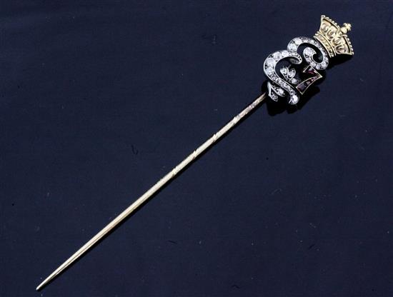 An early 20th century Viennese 14ct gold and silver, ruby and diamond set commemorative Edward VII stick pin, in original box.